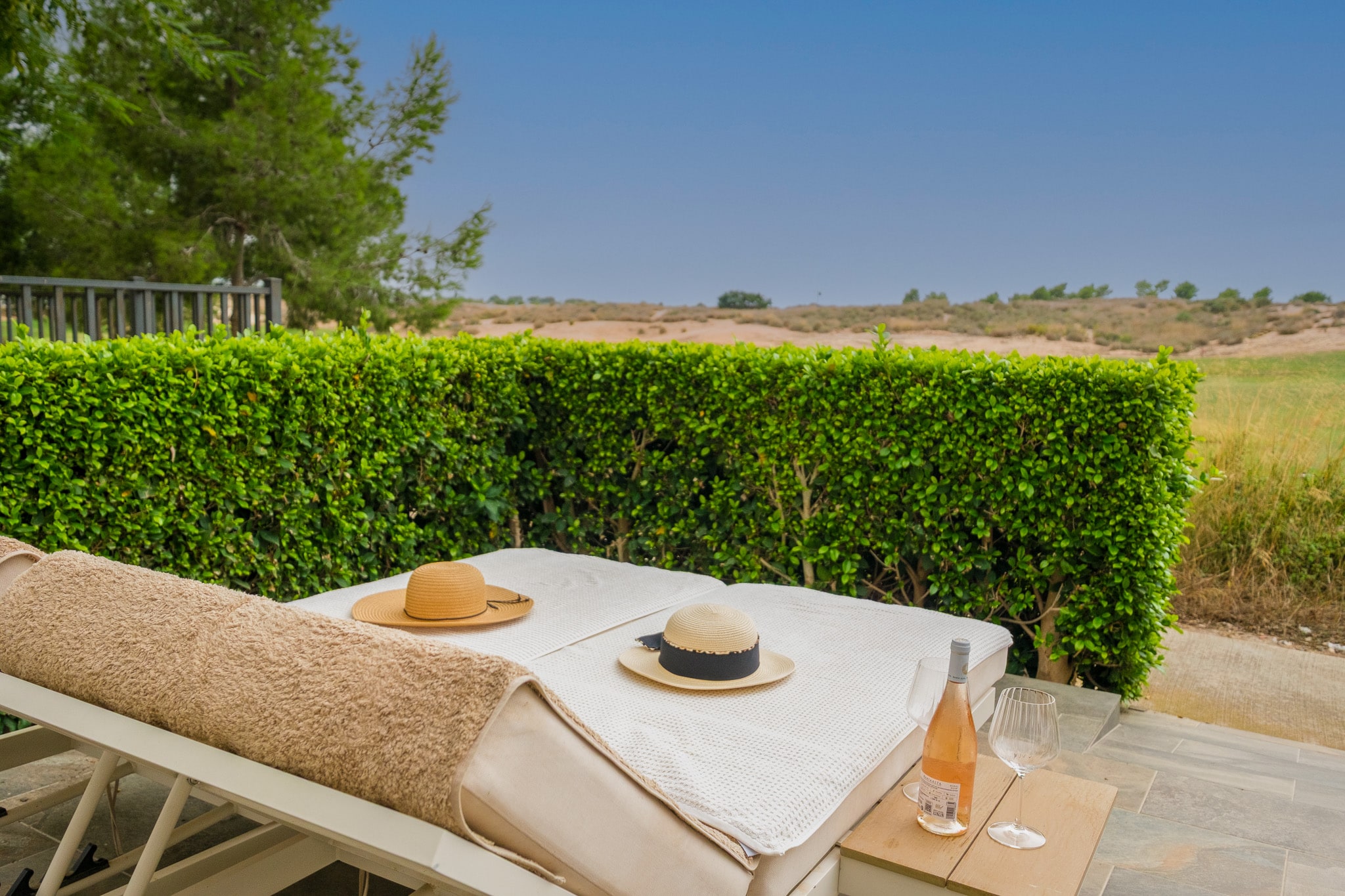 Sol · Outdoor dining and golf views
